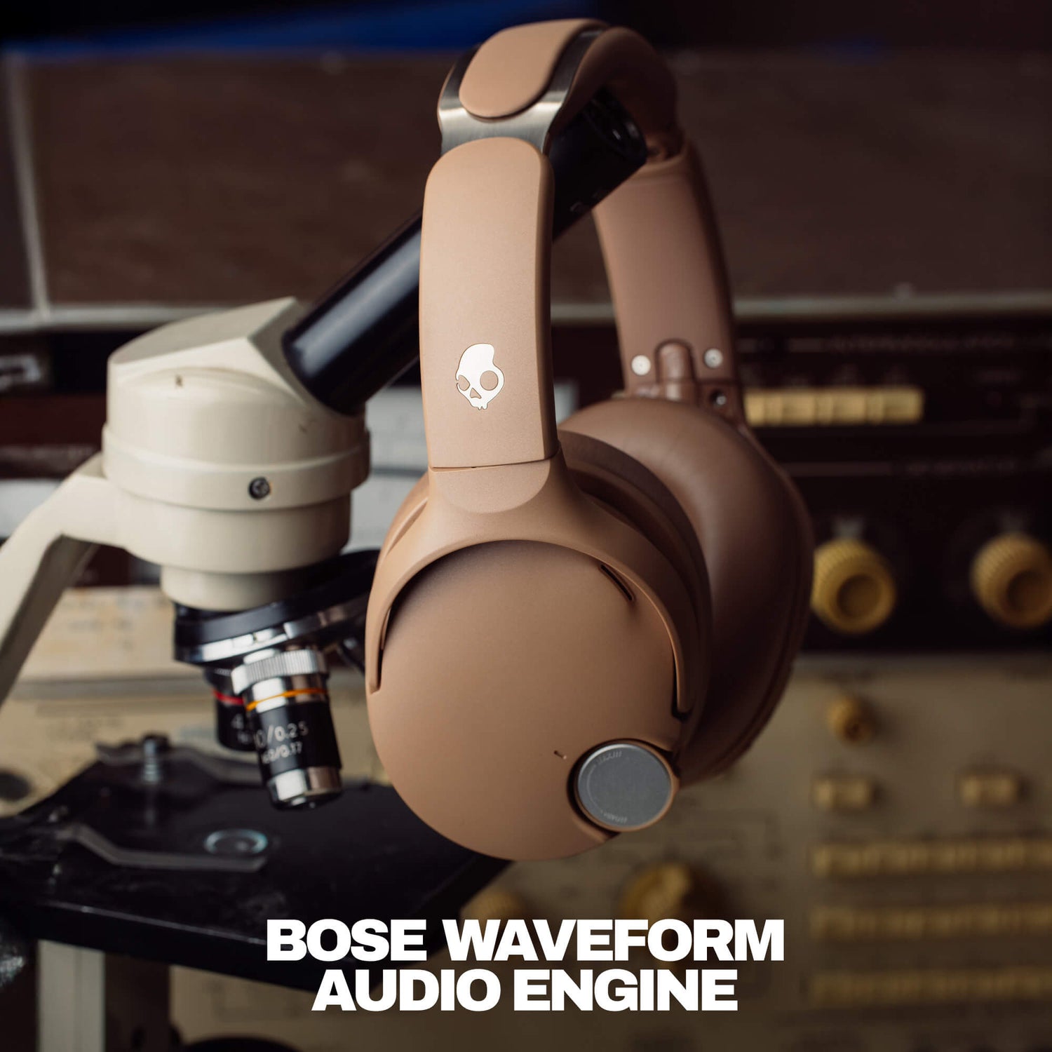 Skullcandy Crusher 1080 ANC headphones on a vintage audio equipment background with 'Bose Waveform Audio Engine' text. | Primer