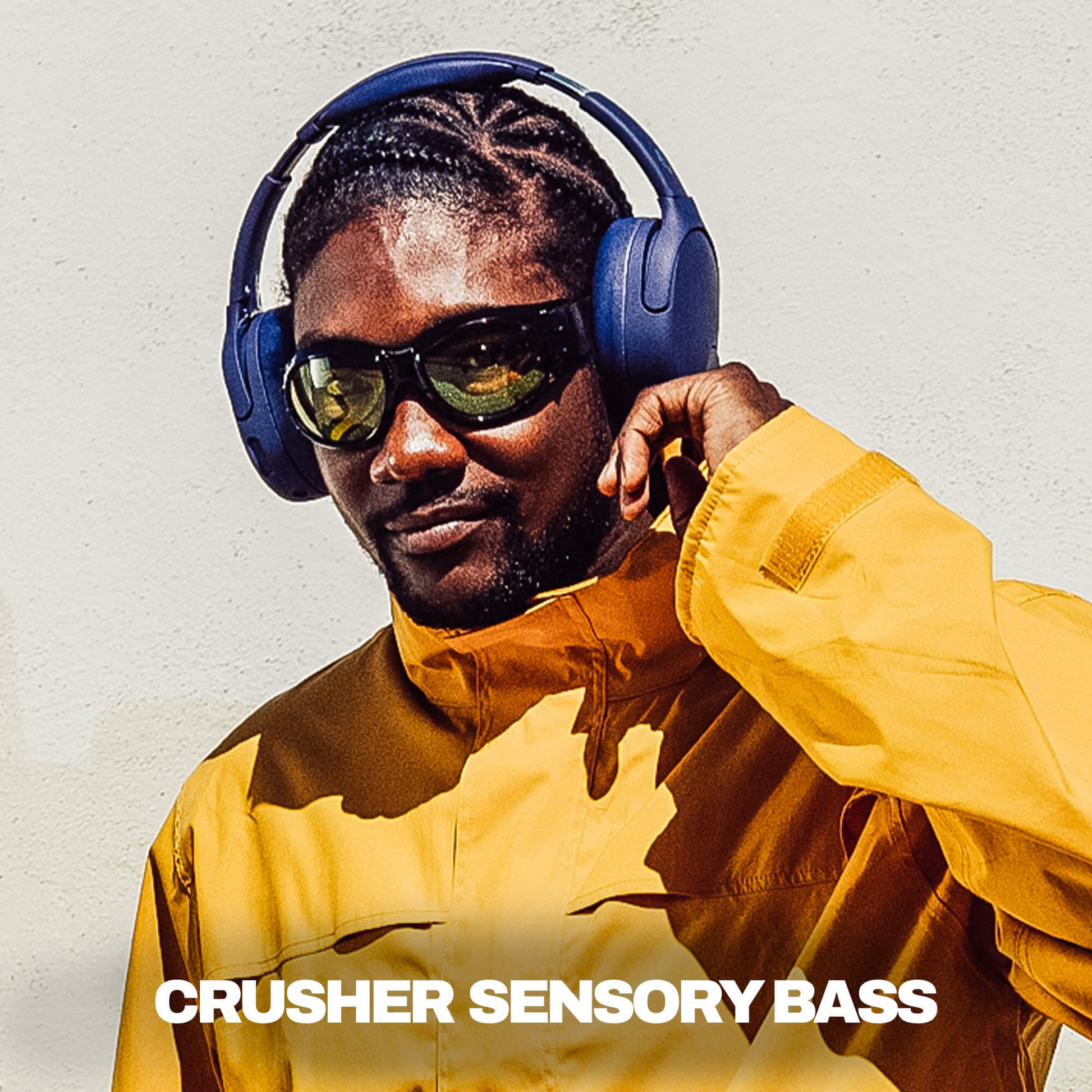 Man wearing purple crusher 720 headphones and yellow jacket with 'Crusher Sensory Bass' text. | Future