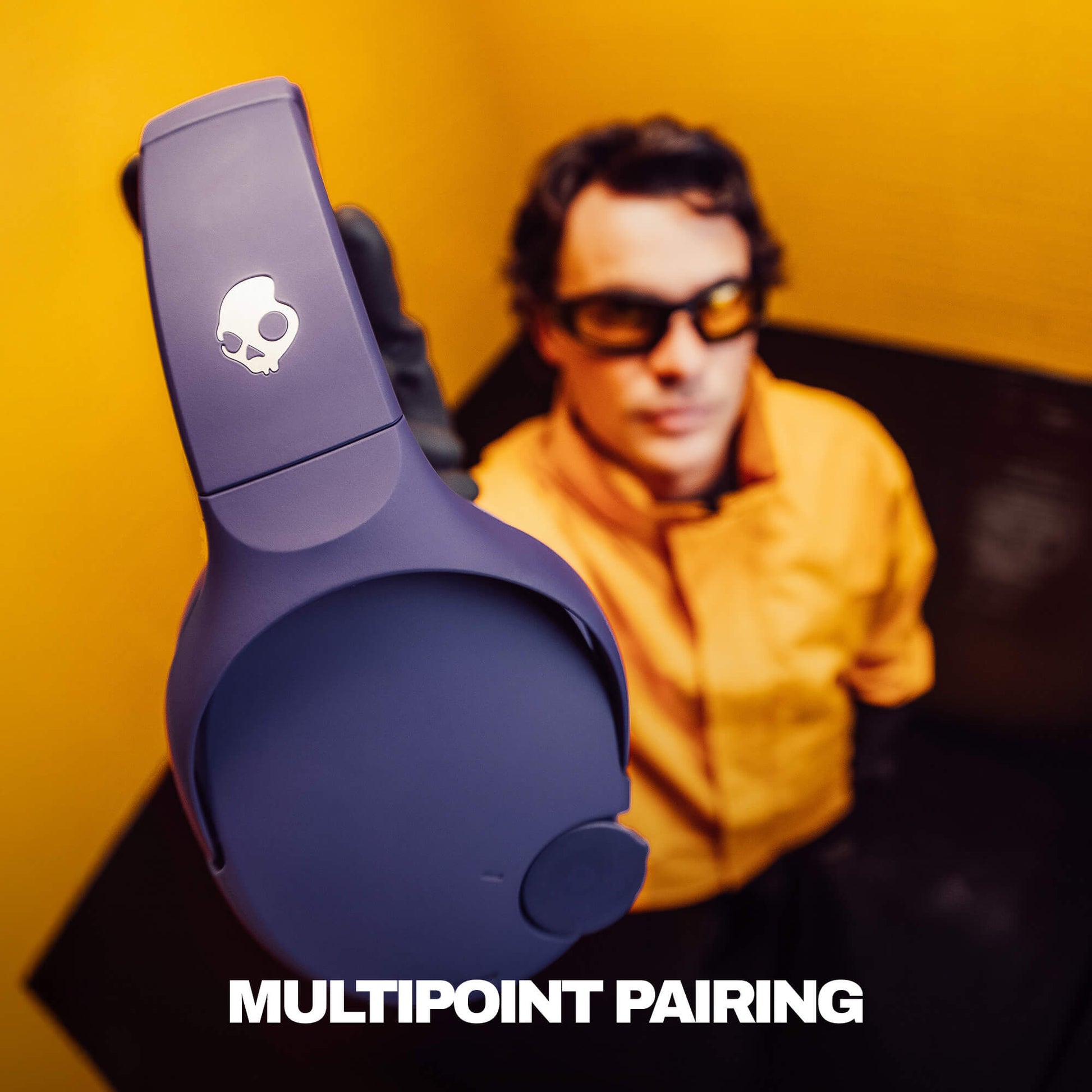 Purple Crusher 720 Headphones with skull logo on a yellow background, featuring text 'MULTIPOINT PAIRING'. | Future