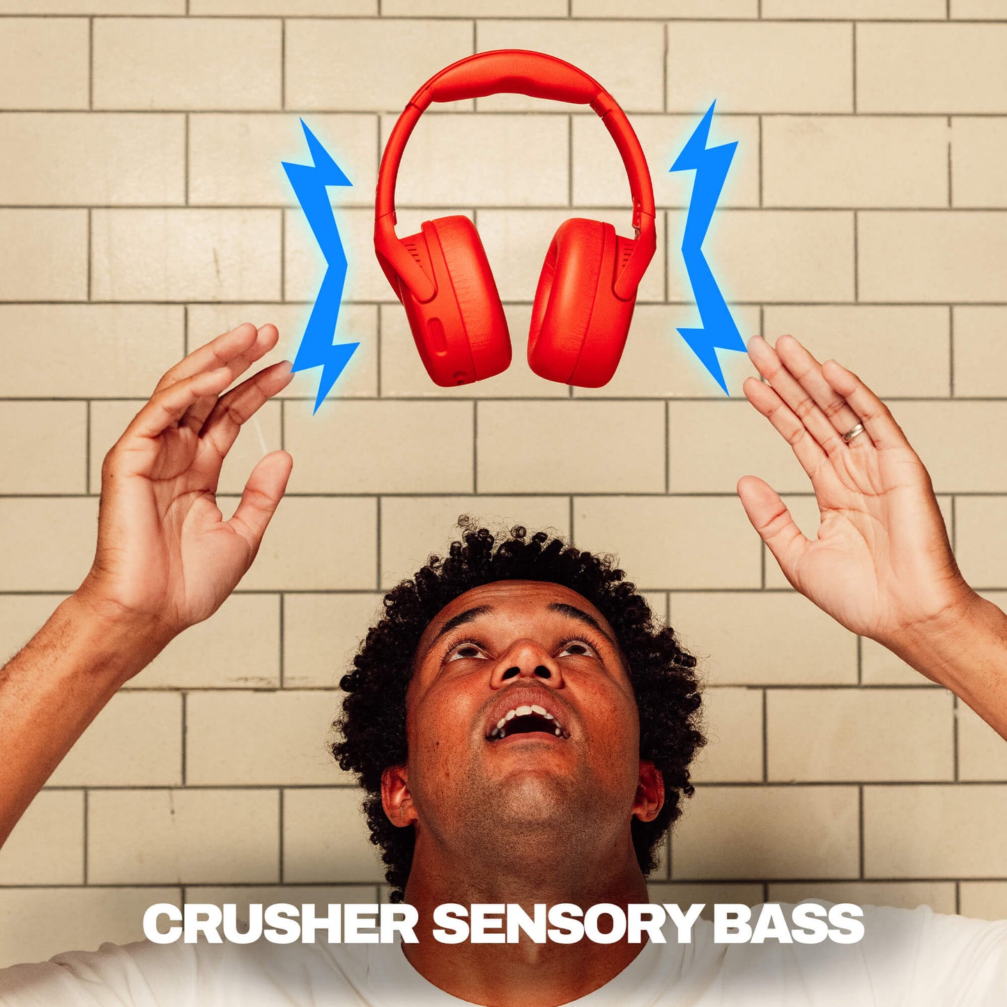 Person with red headphones and blue lightning bolts against a tiled wall, with 'Crusher Sensory Bass' text. | Plasma