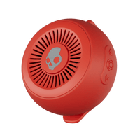 Red portable speaker with a skull design on a black background | Plasma