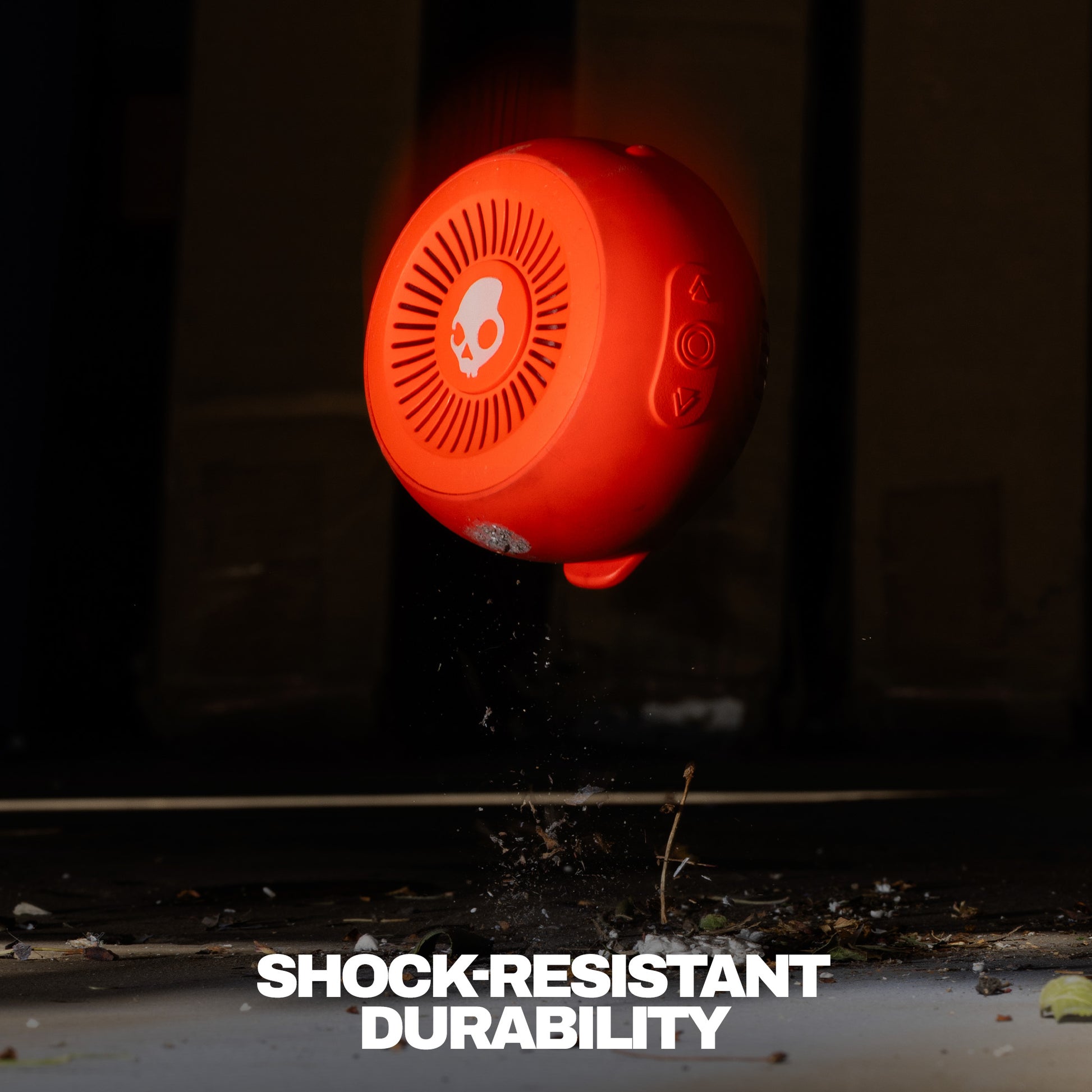 Orange shock-resistant device with durability text on a dark background | Plasma