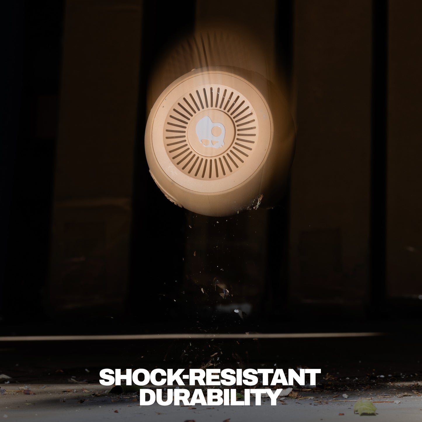 Round shockproof device with 'Shock-Resistant Durability' text on a dark background | Primer